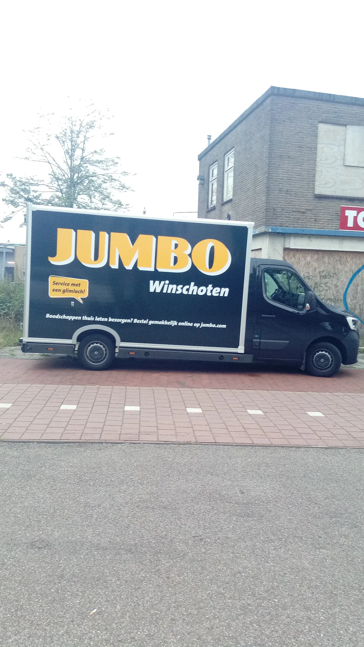 Zakelijke bestelauto van Jumbo Winschoten op straat - voorbeeld bedrijfsauto verzekering Nederland