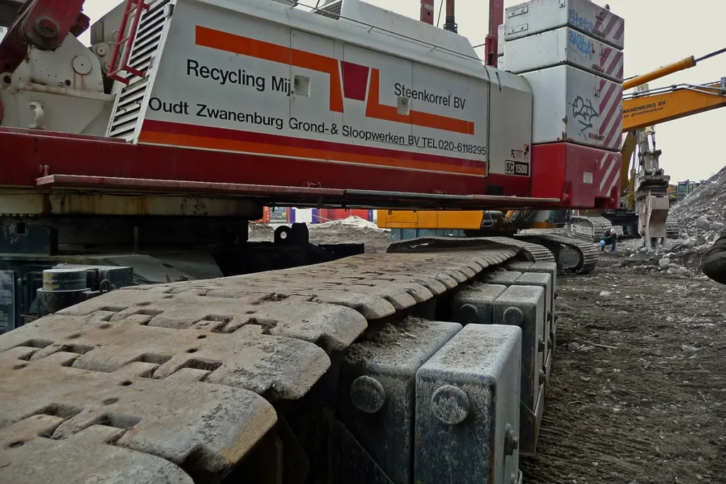 Bouwkraan op bouwplaats in Amsterdam — CAR-verzekering construction all risk voor aannemers