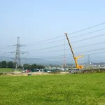 Torenkraan op een bouwterrein — Construction All Risk verzekering dekt schade aan werk in uitvoering